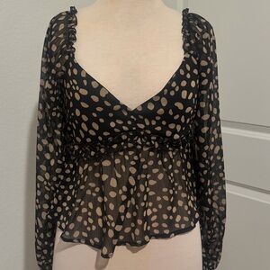 Black Polka Dot Sheer Peplum Top